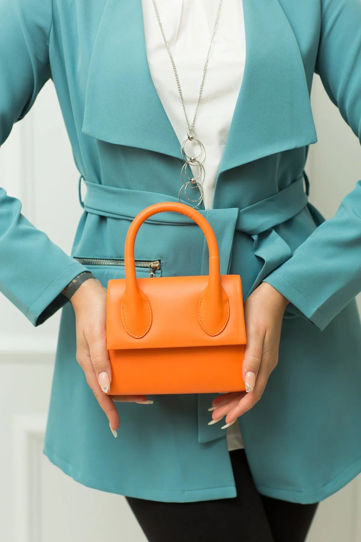 Women Orange Clutch Bag